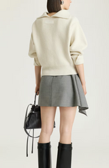 Slashed sweater in wool and cashmere