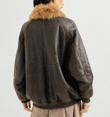Vintage-effect shearling bomber jacket with shiny zipper pull