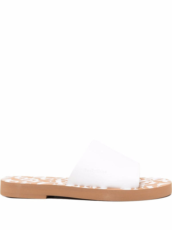 See by Chloé embossed-logo leather slippers - LISKAFASHION