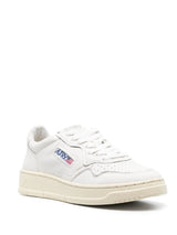 Autry logo-patch low-top sneakers - LISKAFASHION