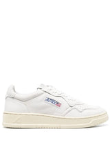 Autry logo-patch low-top sneakers - LISKAFASHION