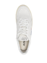 Autry logo-patch low-top sneakers - LISKAFASHION