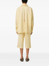 loose wool shirt with back slit in yellow