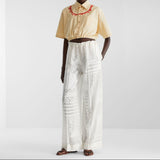 White viscose and silk devoré trousers