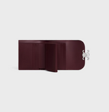 Small flap wallet triomphe in shiny calfskin