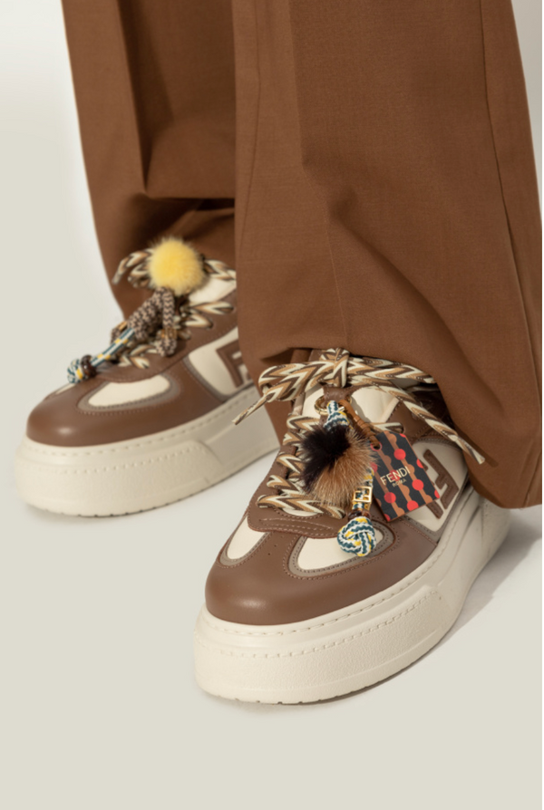 `Match` sports shoes on a platform