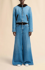 Blue denim trousers with velvet waistband