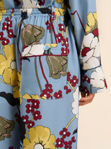 Blue envers satin trousers with Melodia print