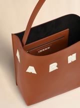 Small brown leather Museo hobo bag with patches