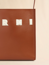 Small brown leather Museo hobo bag with patches