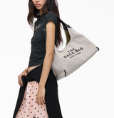 THE LEATHER-TRIM CANVAS BELTED SACK BAG