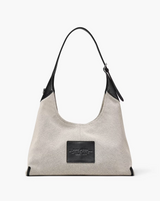 THE LEATHER-TRIM CANVAS BELTED SACK BAG