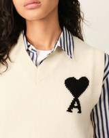 WHITE SLEEVELESS WOOL SWEATER WITH AMI DE COEUR