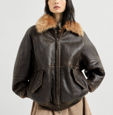 Vintage-effect shearling bomber jacket with shiny zipper pull